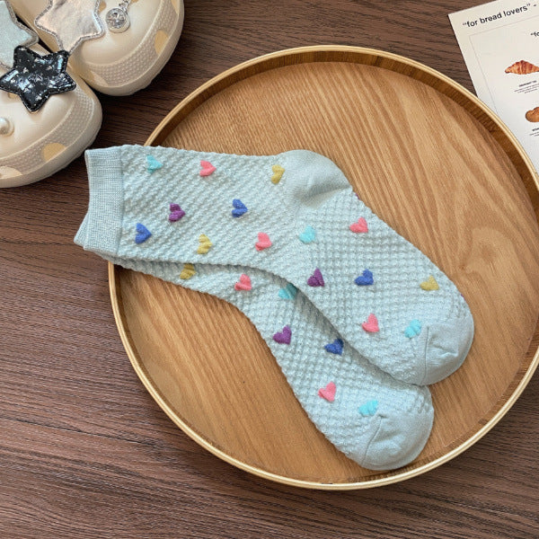 Chaussettes douces avec petits cœurs en relief – Confortables et mignonnes